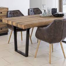 While there are no points for guessing the necessity of a dining table, economical home improvement enthusiasts might want to move one step ahead with their woodworking skills to construct one at home. Buy Recycled Wood Plank Top Dining Table Chunky Metal Frame Tables