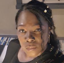 The son of murdered Rautie Esther Gopaul, who was tied up, gagged, and  smothered to death in her bed by intruders last week, broke down and could  not complete the last rites