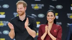 A source describes her as believing: Prince Harry Says Walking In Meghan Markle S Shoes Taught Him About Unconscious Bias Entertainment Tonight