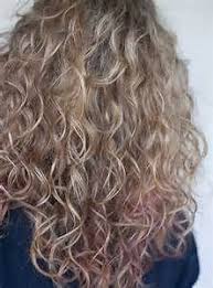 This means that the harsher edges of your face gets covered and jennifer hudson's elegant hairstyle is cut to one length with short to long layers through the back and. Long Blonde Curly Hairstyle Back View Bing Images Hair Styles Curly Hair Styles Long Hair Styles