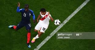 france s midfielder n golo kante and peru s midfielder edison flores n golo kante licence lea