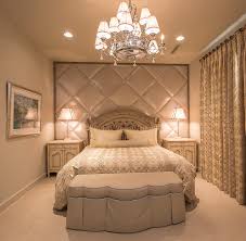 A wood trimmed tufted lavender bed anchors this expansive guest bedroom. Wall Treatment Design Carefree Az Wall Treatments Scottsdale Az Wall Treatment Installation Fountain Hills Az Paradise Valley Az