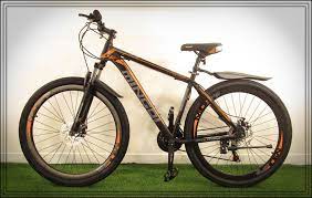 MINGDI 29-es kerékpár fekete-narancs színben - Készletkisöpr