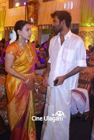 In the picture, we can see dhanush gazing towards the balloons that spell the number '37' with his back to the camera. Dhanush With His Wife At Anirudh Sister Wedding Photos Veethi Indian Bridal Look Bollywood Celebrities Indian Bridal