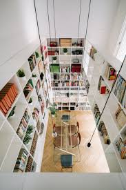 Westelm.com has been visited by 100k+ users in the past month Two Storey Bookshelf Rises Inside Renovated Madrid House