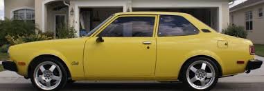 Image result for Bright Yellow 1980 Colt