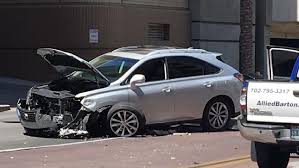 Woman injured after RTC bus, Lexus crash in downtown Las Vegas