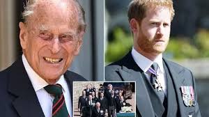 Prince Charles laughs off Prince Harry's attacks as he struggles to drink  pint