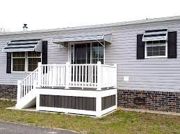 Shown Here Are Two Series 3500 Aluminum Window Awnings And A Series 1500 Aluminum Door Canopy By Nuimag Aluminum Window Awnings Aluminum Awnings Window Awnings