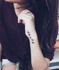 Birds Hope And Freedom Small Wrist Tattoos With Powerful Meanings Small Tattoo Designs Meani Tattoo Designs Wrist Small Wrist Tattoos Finger Tattoos