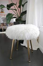 Clean gold and white palette. Furry Stool A Beautiful Mess I Ve Decorated Most Rooms Of My House But The One That I Ve Neglect Home Decor Bedroom Diy Home Decor Projects Home Decor Store