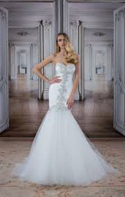 The mermaid silhouette is fitted in the natural waist, hips, and thighs. See Pnina Tornai Wedding Dresses From Bridal Fashion Week Pnina Tornai Wedding Dress Wedding Dresses Simple Fit And Flare Wedding Dress