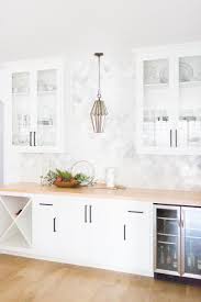 Tulsa Remodel Reveal Modern White Farmhouse With Black Windows And Doors Marble Herringbone Backsp Backsplash For White Cabinets Kitchen Remodel Home Kitchens