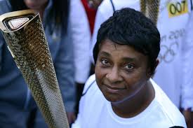 Olympics live: Murray carries Flame at Wimbledon