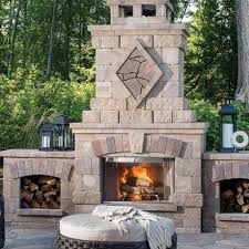 A chiminea can offer warmth and artistry to your patio. Outdoor Stone Fireplace Kitchen Kits Belgard Pavers