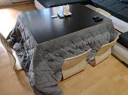 Kotatsu are usually fitted with a blanket that traps heat beneath the table. How To Diy Kotatsu Tabimonogatari æ—…ç‰©èªž