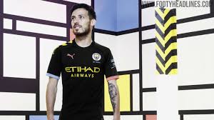 The highlight of this kit is its beautiful moon graphic which appears in tonal blue hues, subtly contrasting the sleeves and shoulders. Manchester City 19 20 Away Kit Released Footy Headlines