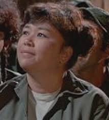 The flange with the cam fits in the...?