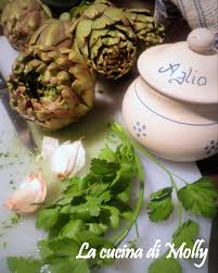 Bagnare bene con il succo di limone e battere la cima su un tagliere per favorire l'apertura durante la cottura. La Cucina Di Molly Carciofi Lessi In Pinzimonio