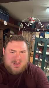 Josh doesn’t play about HIS BABY!!! #bookstagram #indiebookshop  #carrolltonga #undergroundbooks #downtowncarrollton #booklover #pet