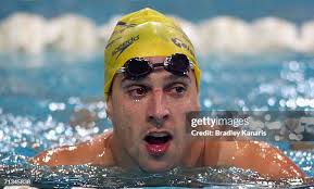Glenn Tasker and Neil Martin of Swimming Australia with Ryan Mitchell...  News Photo