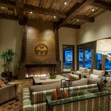 From exposed wood ceiling beams, to stone rustic living rooms can still embody grace and elegance. Photos Hgtv