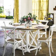 This is the perfect farmhouse style set in a lightly distressed cream color and dark brown/grey wood! Provincial Oak Round Dining Table 1400mm Distressed White With 4 Provincial Cross Back Dining Chairs Vintage White Package Dining Packages Dining