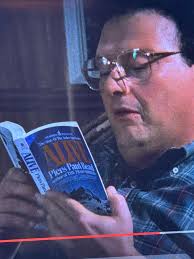 Has anyone ever noticed what book Newman is reading when Kramer is in the  hot tub with butter?.. The book makes the scene funnier