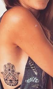 Hippie Hamsa Hand Tattoo Ideas For Women Psychedelic Tribal Rib Tatouage Ideas De Tatuajes Para Chicas Hamsa Hand Tattoo Rib Tattoos For Women Rib Tattoo