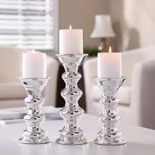 Pillar candle holders are available in hurricane holders, pillar plates. Ceramic Metallic Pillar Candle Holders Set Of 3 Silver Buy Online In Faroe Islands At Faroe Desertcart Com Productid 62693537