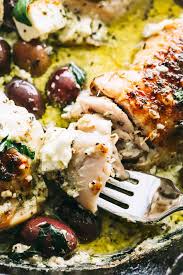 Baked Pesto Chicken Recipe With Olives Feta Keto Chicken Dinner Baked Pesto Chicken Chicken Pesto Recipes Olive Recipes