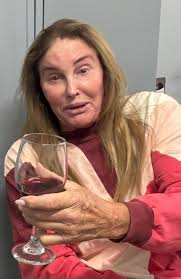 Caitlyn Jenner looks DEMURE as she drinks a glass of wine in a bomb shelter  in Tel Aviv ❤️