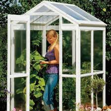 The spruce planks are used. 11 Awesome Greenhouse Ideas For Spring The Family Handyman