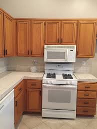 orange oak cabinets, want farmhouse look