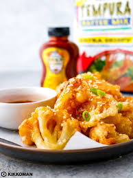 In a small bowl, whisk together batter, mix and water until blended. Sriracha Cauliflower Wings Recipe Cauliflower Wings Vegetarian Appetizers Hot Chili Sauce