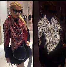 Paris Hilton Wearing An Anti-Paparazzi Scarf That Ruins Photos By Affecting  Flash Photography. : r/Damnthatsinteresting