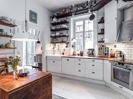 Grey shaker kitchen with oak worktops expressvpn review reddit. Room Bright Kitchen Features A Rail For A Library Ladder That Also Serves As A Pot Rack Pl Scandinavian Kitchen Design Swedish Kitchen Swedish Kitchen Design