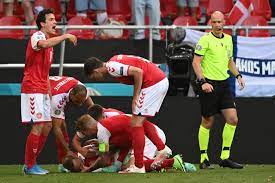 Christian eriksen is taken off the pitch on a stretcher. Danish Soccer Star Christian Eriksen Stabilized After Collapsing On Field During Match
