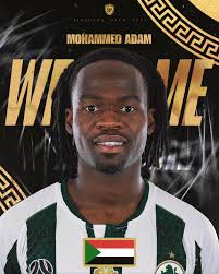 مجلس الإدارة يبدأ في تدعـيم صفوف الفريق الأول وهـذه المـرة بالتعاقد مع  مهاجم المنتخب السوداني #محمد_أدم‏ قادماً من نادي #Green_Gully الأسترالي  🟢🟡 . #alsadaqaSC #نادي_شحات #الدوري_الليبي #الصداقة