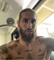 His back is covered with many different tattoos and it hard to describe all the diversity. Real Madrid La Liga Sergio Ramos Has His Chest Tattooed With The Name Of Adriano His Fourth Son Marca In English
