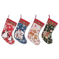 This cable knit stocking is designed with a white cuff, adorned with a classic cable knit pattern, and accented with pompoms and a button. 18 Set Of 4 Polar Bears Rudolph Penguins And Gingerbread Man Christmas Stockings Clic Christmas Stockings Amazon Deals Shopping Products Decorated Stockings