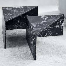 Nesting Marble Side Tables Black For a touch of art deco glam, we finished the sculptural metal bases of our round nesting tables with smooth marble tabletops.