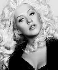 One of the world's favorite musicians for her daring music videos as much as her singing style christina aguilera rocks fans wherever she goes. Beautiful Black White Blonde Hair Christina Aguilera