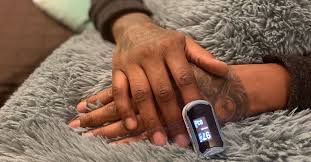 A pulse oximeter probe applied to a person's finger. Black People Are Three Times More Likely To Experience Pulse Oximeter Errors The Pursuit Center University Of Michigan School Of Public Health Coronavirus Epidemic Health Disparities Health Care Access Racism