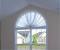 Curtains Over Arched Window
