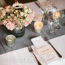 The vivid pink tulips evoke the springtime theme. Gray And Pink Table Setting