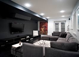 The botanical motive will also bring more life and freshness to the room while staying a black accent wall definitely pops and its slightly distressed look adds character to the whole room. 20 Knockout Black Accent Wall In The Living Room Home Design Lover