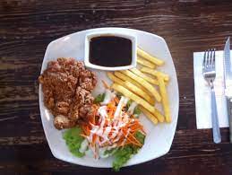We didn't, but were lucky enough to get a table located at the alleyway by the side of the restaurant; Chicken Chop E Place Tanjung Malim Makanjelah