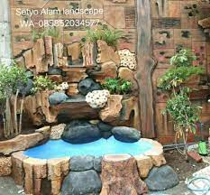 Kolam minimalis, tukang taman, kolam hias ikan koi, tukang kolam murah, jasa pembuatan kolam, tukang taman relief, tebing air mancur, kolam ikan koi, kolam air mancur, desain kolam kecil depan rumah, harga pembuatan kolam hias, gaya kolam natural, kolam air terjun, arsitek kolam hias. Contoh Desain Relief Tebing Setyo Alam Landscape