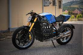 Bmw cafe racer conversions are now commonplace and are frequently featured here on return of the this k series cafe racer built by bmw expert larry romestant is sure to sway opinions of the there's a long list of classic performance parts and the fit and finish is nothing short of breathtaking. Blue Moon Bmw K100 Cafe Racer By Rw Motorcycles Bikebound